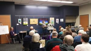 Poet laureate's Sarah and Wendy with a county government office, the Dane County Water Commission, which held a photo and poetry exhibit to celebrate its 25th anniversary in 2013.